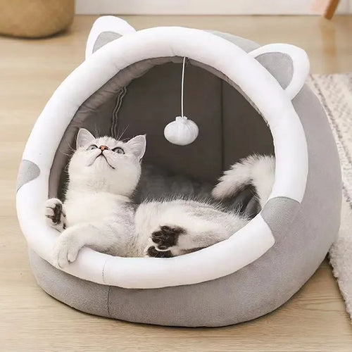 Self-warming cave bed for cats