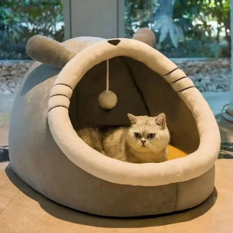 Self-warming cave bed for cats